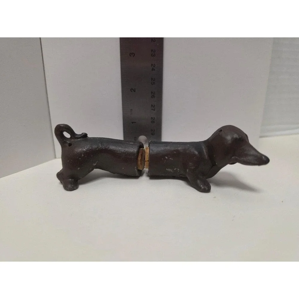 Vintage cast iron dachshund dog figure two-piece set salt and pepper shakers